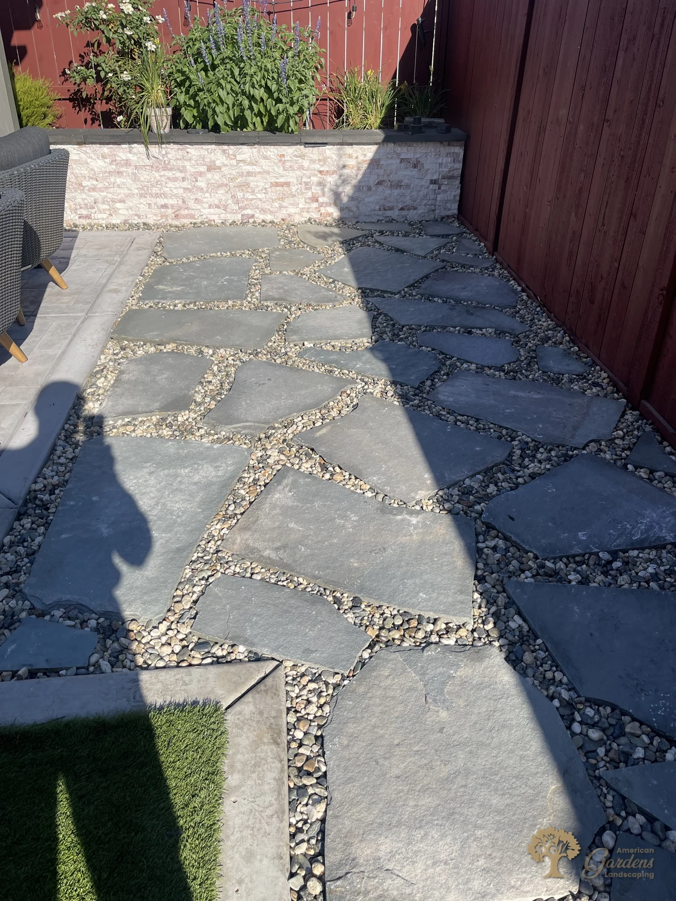 Rocklin Backyard Landscaping – Flagstone Patio with Pebble Joints – American Gardens Landscaping