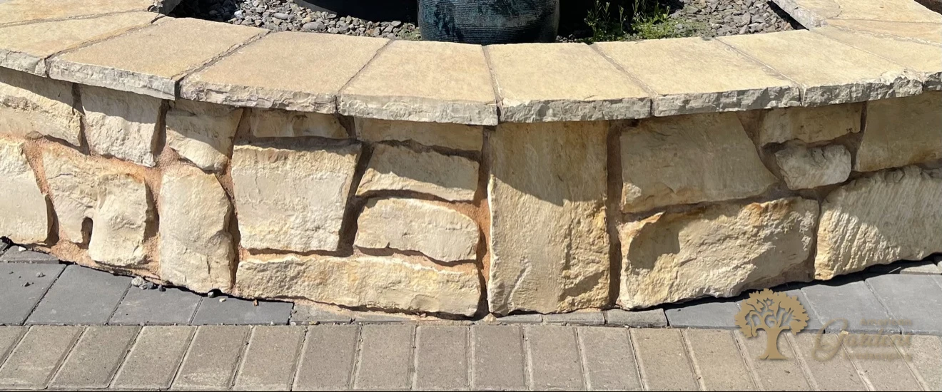 Natural stone planter wall with capstones in El Dorado Hills