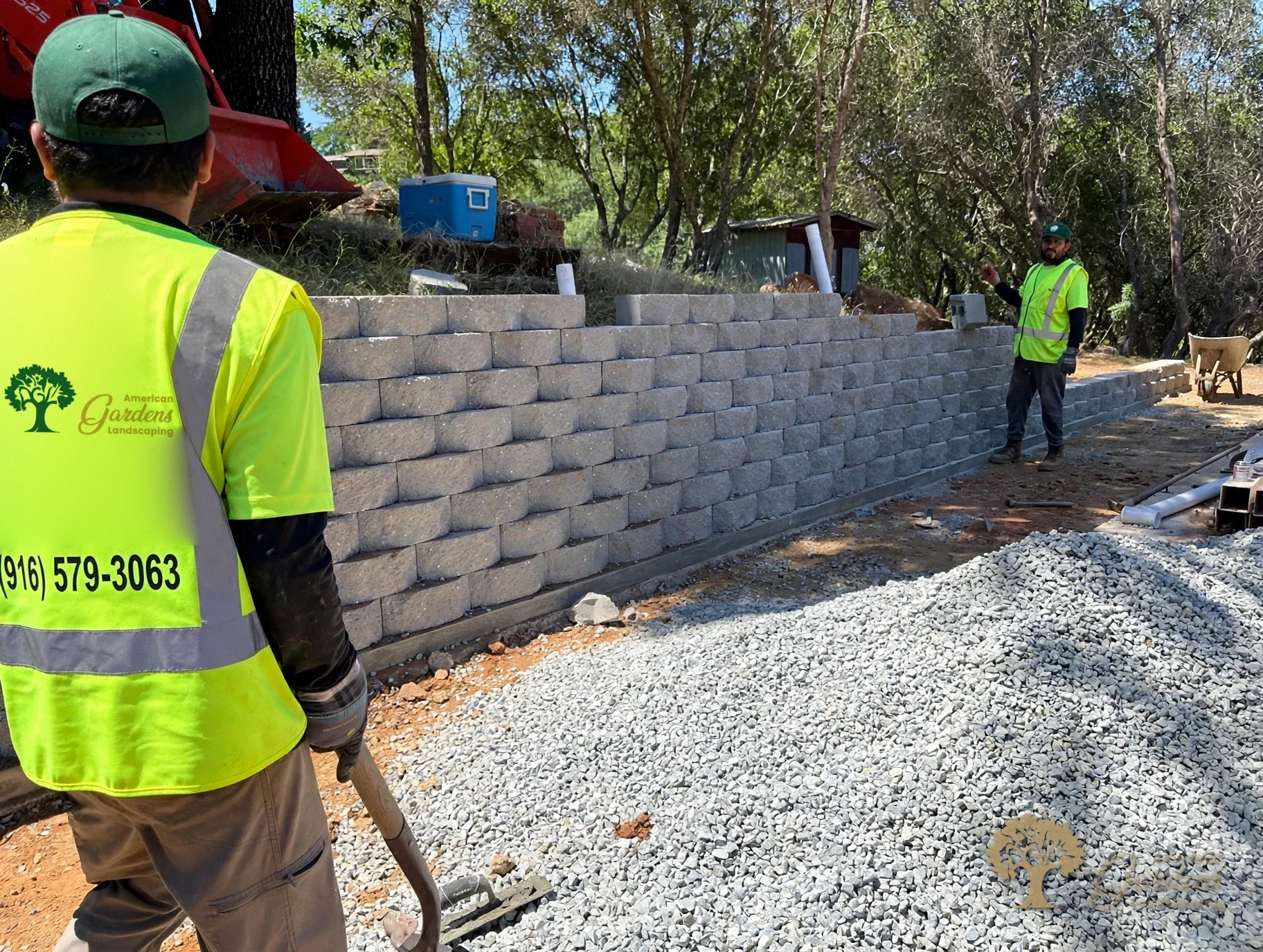 Crew building a block retaining wall in El Dorado Hills