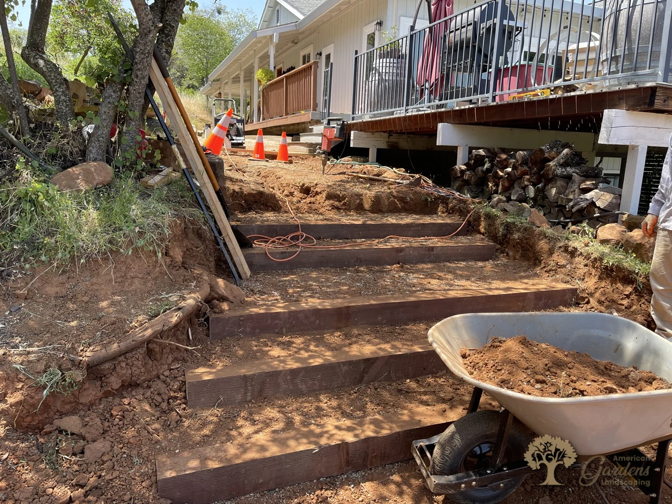 Pressure-treated wood steps under construction on a Shingle Springs hillside – American Gardens Landscaping