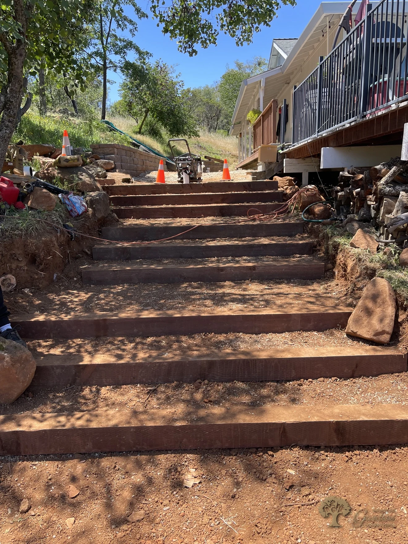Completed run of pressure-treated wood steps before gravel treads are added, Shingle Springs – American Gardens Landscaping