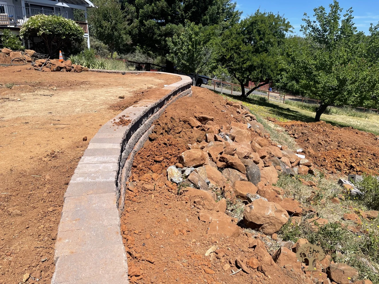 View along the capstones of a curved segmental retaining wall in Shingle Springs