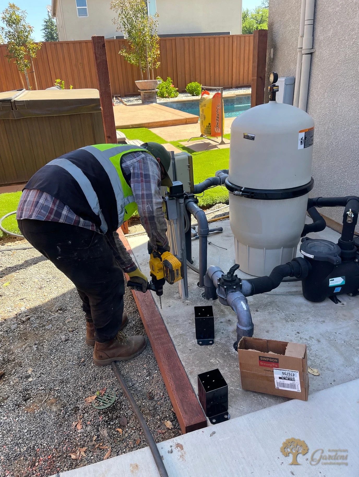 Setting the enclosure posts beside the pool filter in Rocklin – American Gardens Landscaping