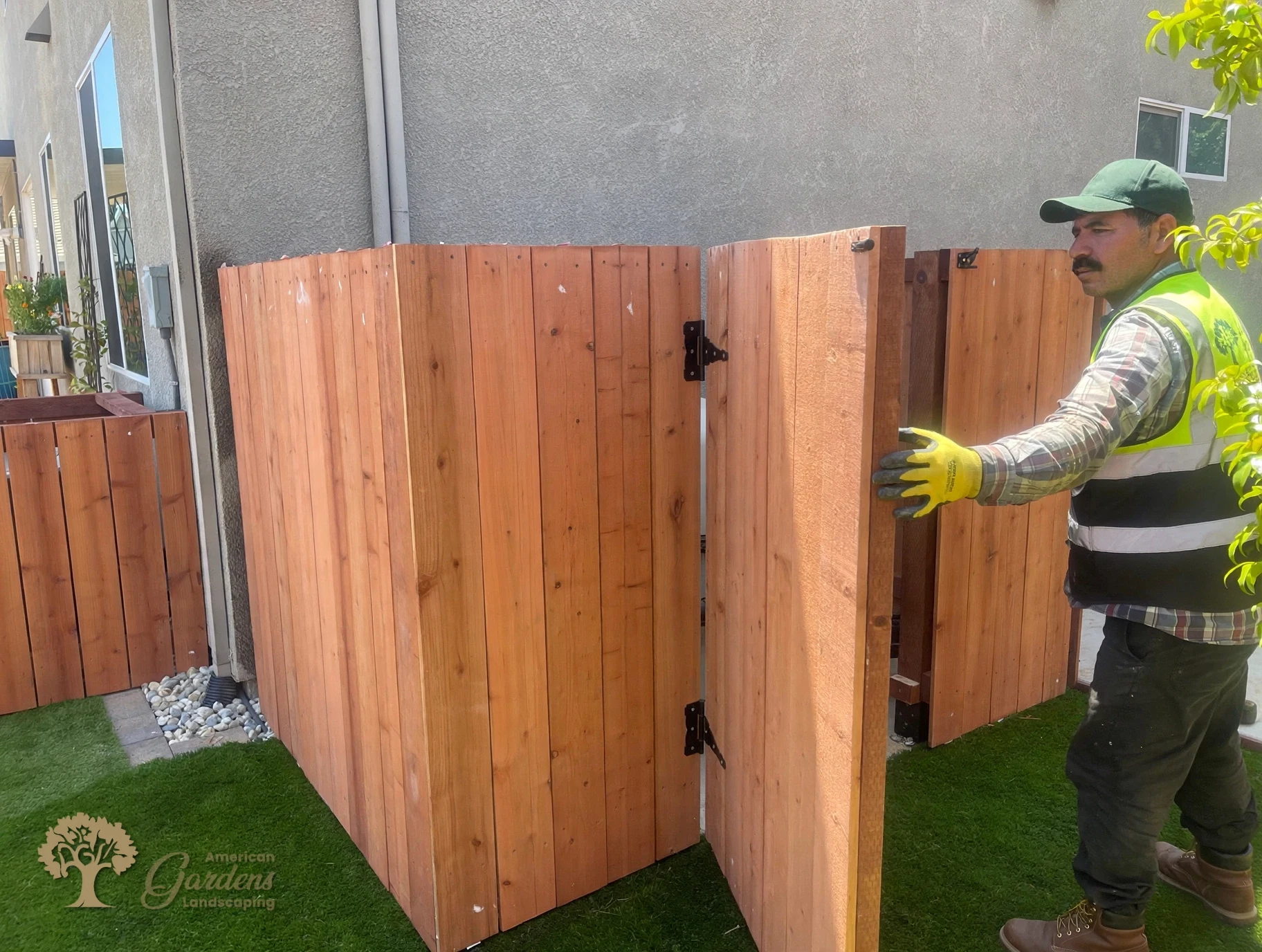 Redwood gate for the pool equipment enclosure in Rocklin – American Gardens Landscaping