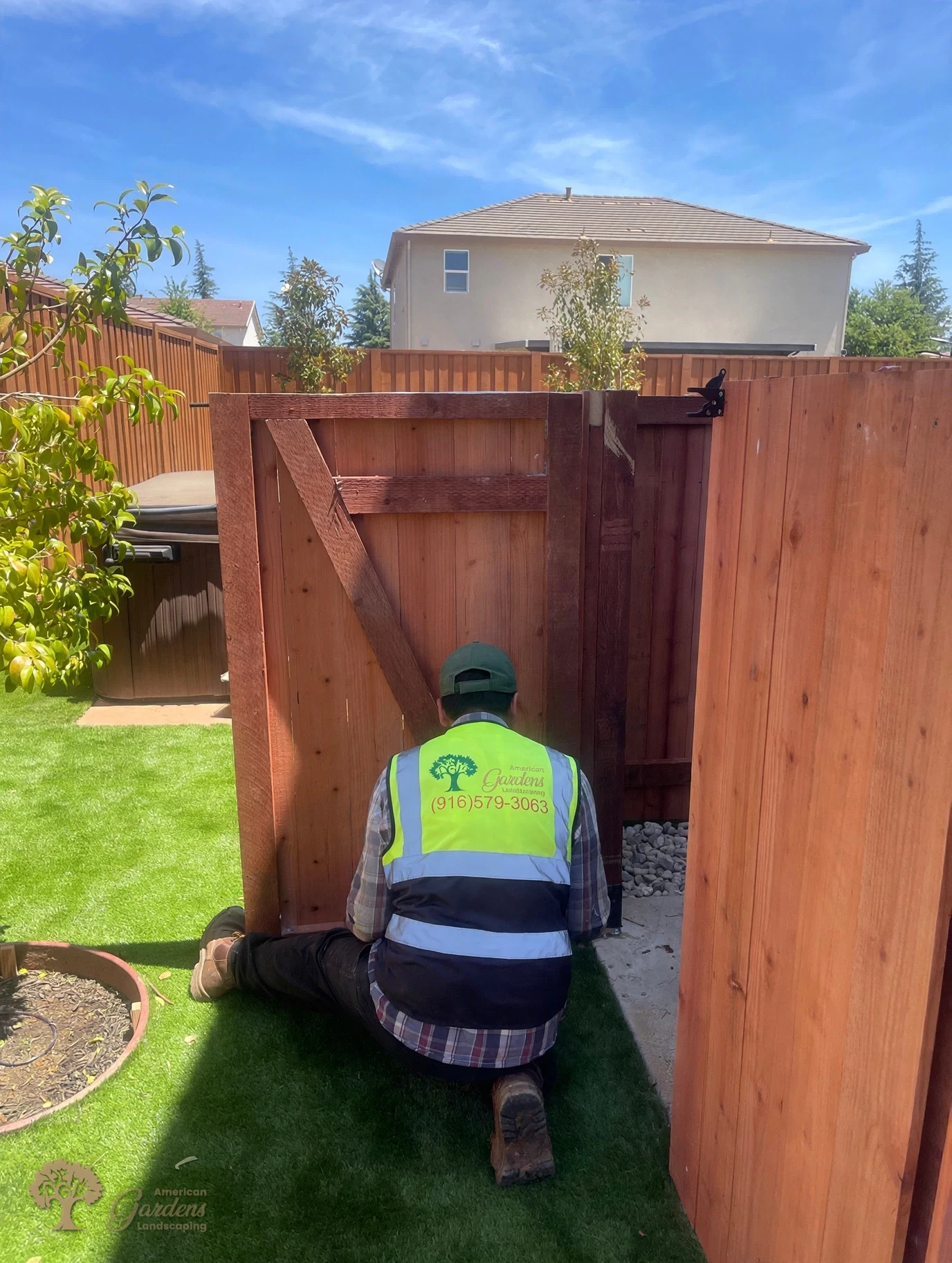 Fitting the enclosure gate in Rocklin – American Gardens Landscaping
