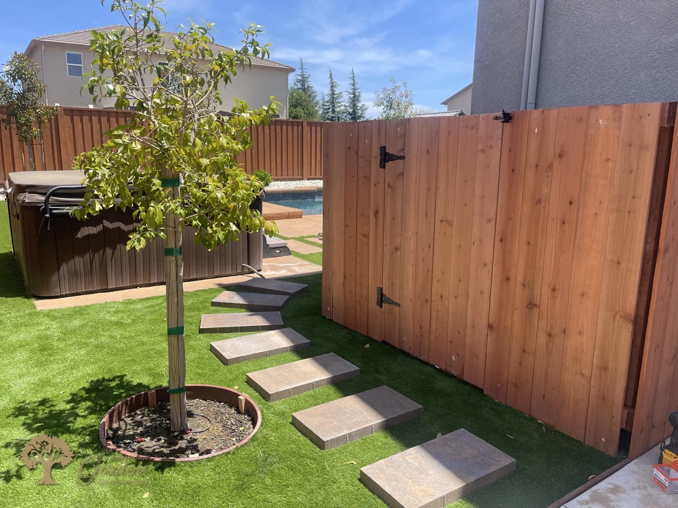 Finished redwood enclosure for the pool equipment in Rocklin – American Gardens Landscaping