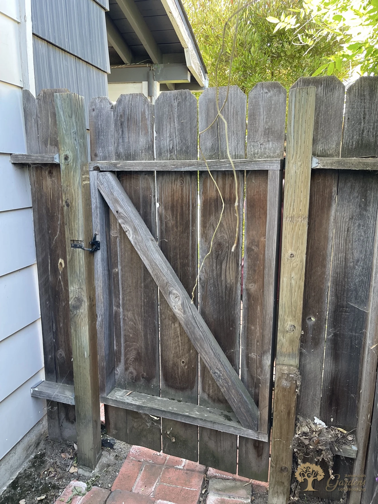 Old fence and gate slated for demolition in Sacramento – American Gardens Landscaping