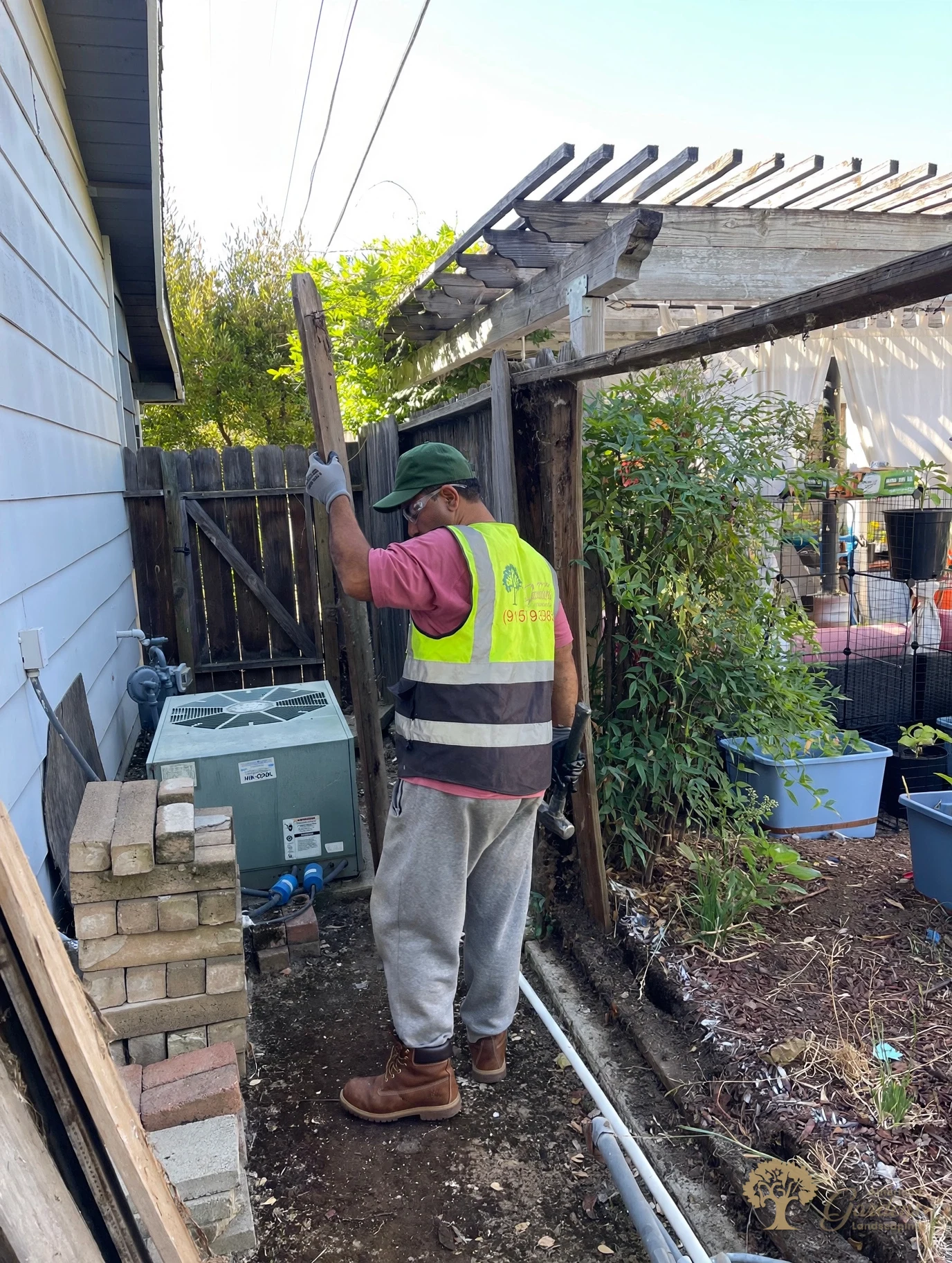Pulling out the old fence posts in Sacramento – American Gardens Landscaping