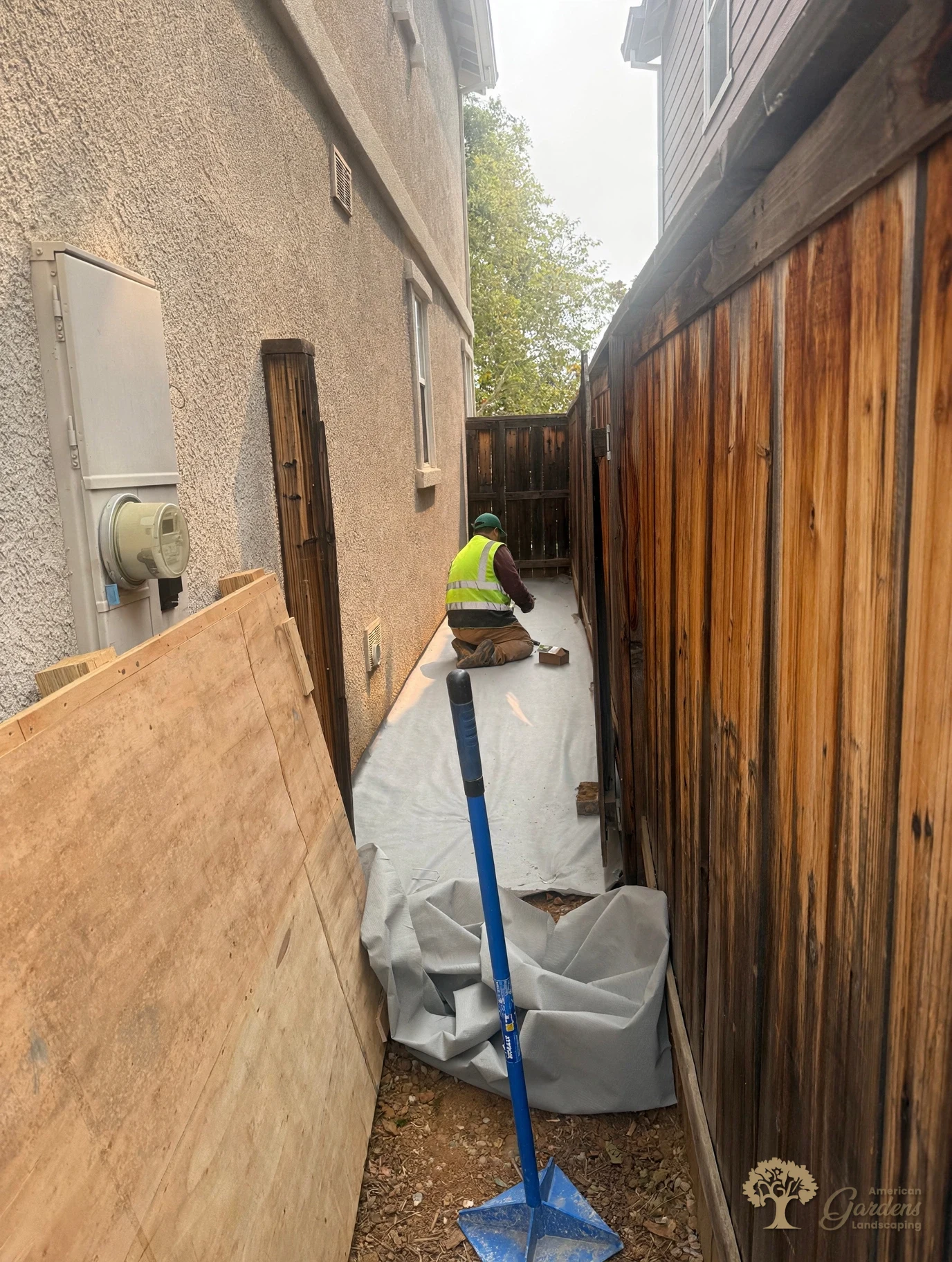Weed fabric laid and pinned for artificial turf installation in Rocklin – American Gardens Landscaping