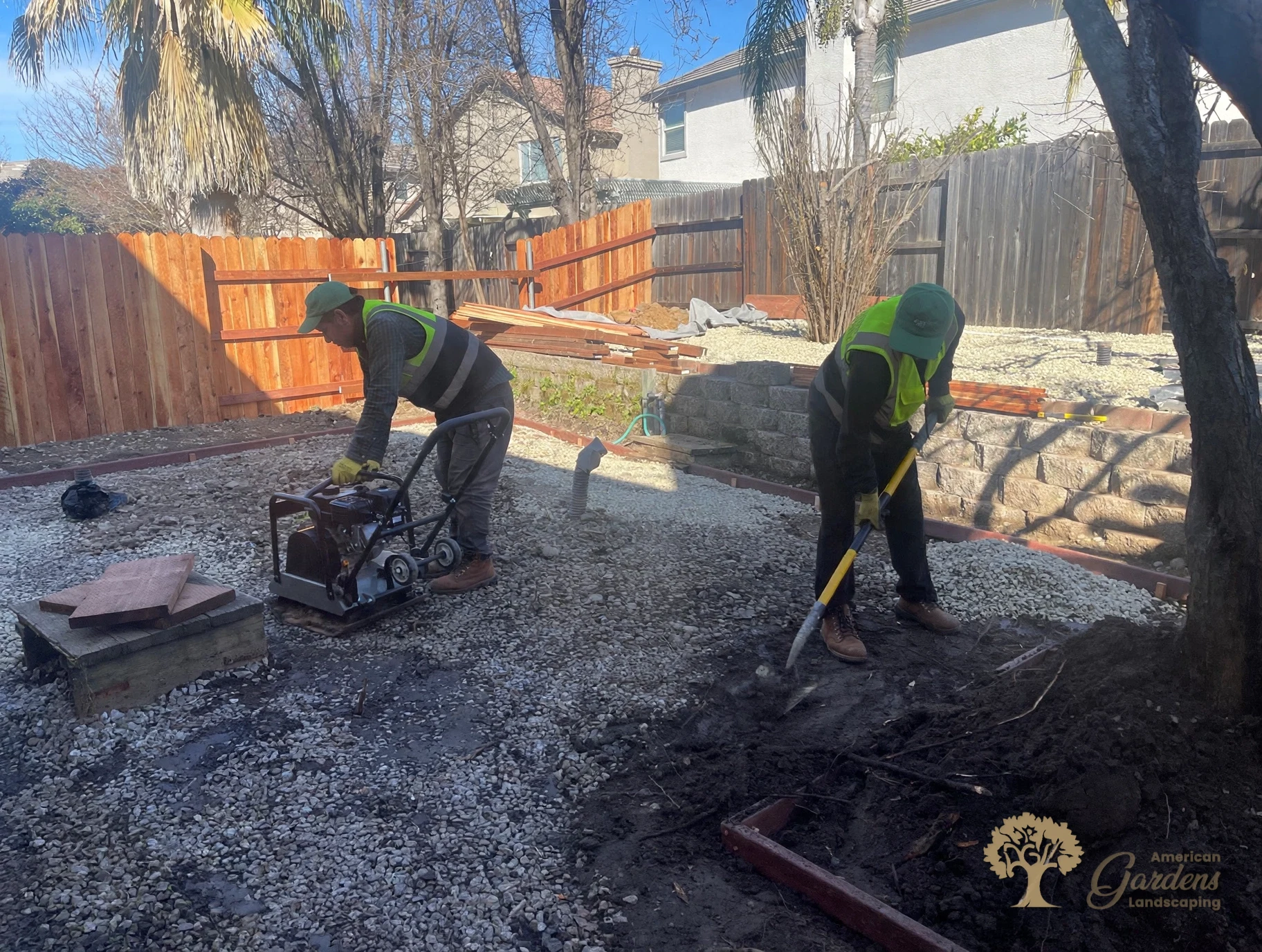 Compacting the base while grading continues in Folsom – American Gardens Landscaping