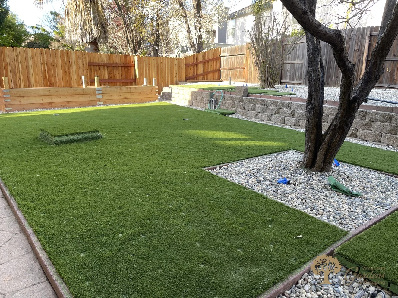 New artificial grass beside the house in Folsom – American Gardens Landscaping