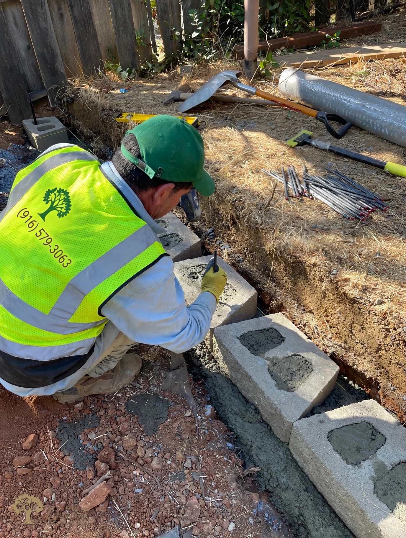 First block course with rebar for the retaining wall in Shingle Springs – American Gardens Landscaping
