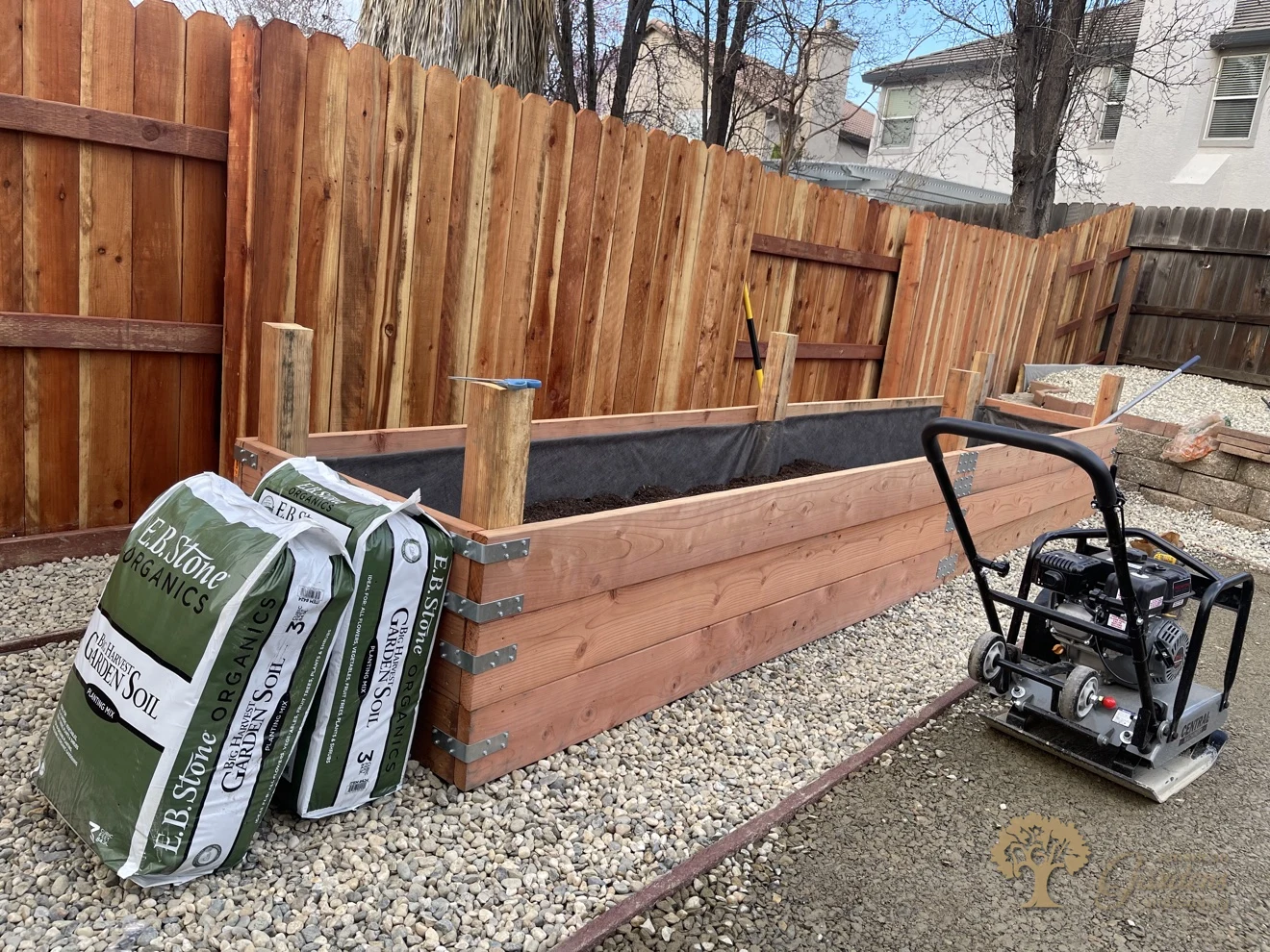 Redwood raised bed built with Simpson steel brackets in Folsom – American Gardens Landscaping