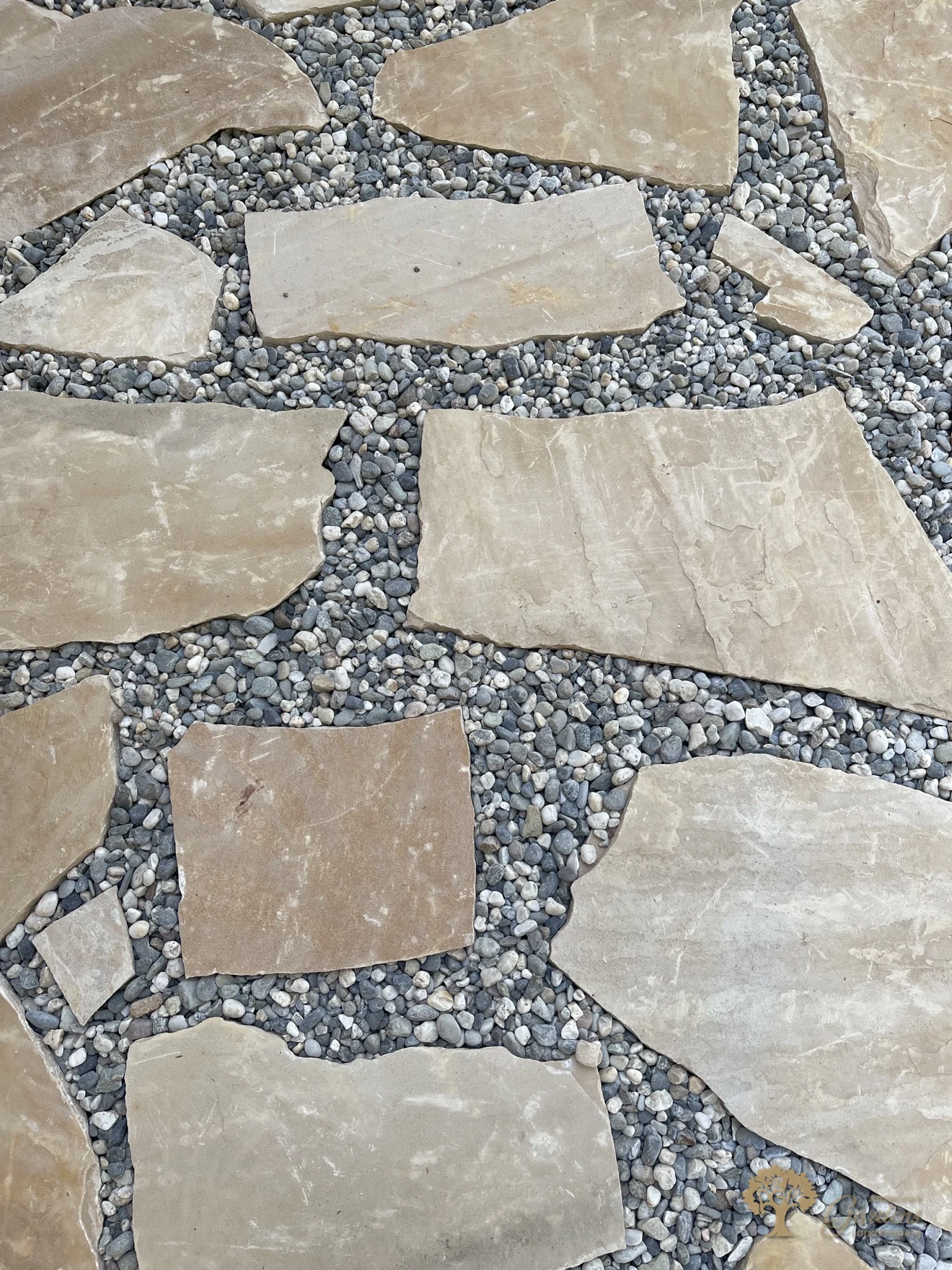 Flagstone and pebble patio detail in Shingle Springs – American Gardens Landscaping