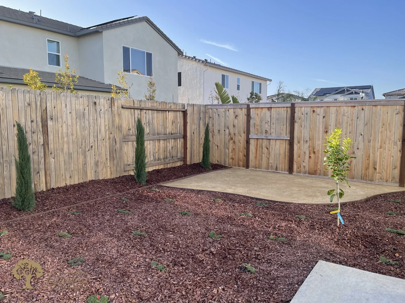 Finished yard seen from the gate in Lincoln – American Gardens Landscaping