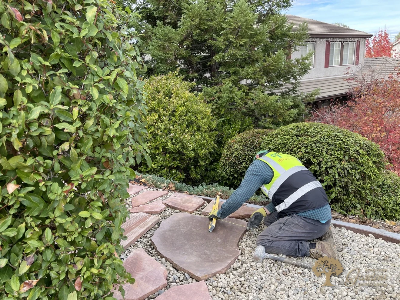 Leveling a flagstone walkway by hand in El Dorado Hills – American Gardens Landscaping