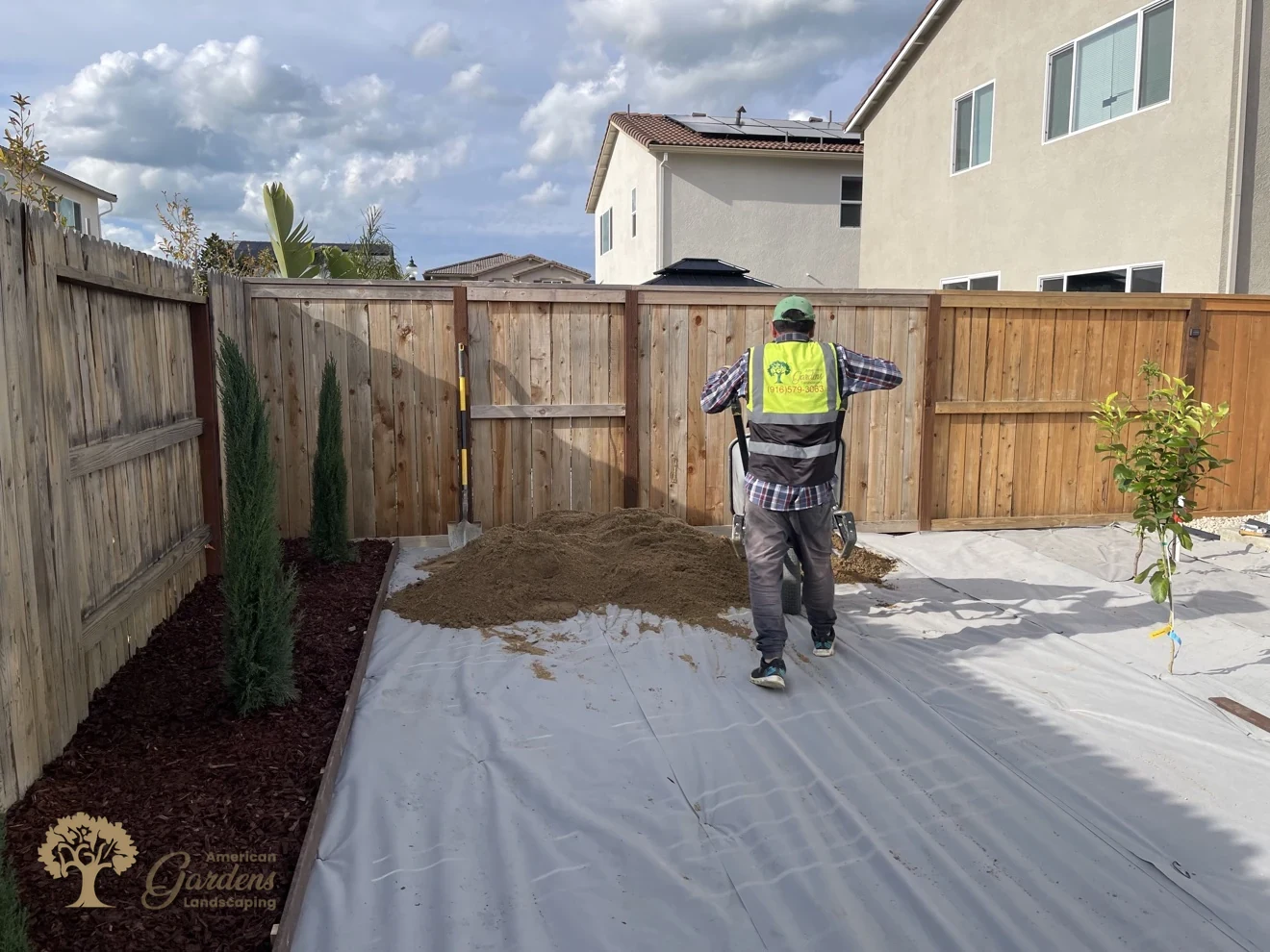 Raking the decomposed granite pad in Lincoln – American Gardens Landscaping
