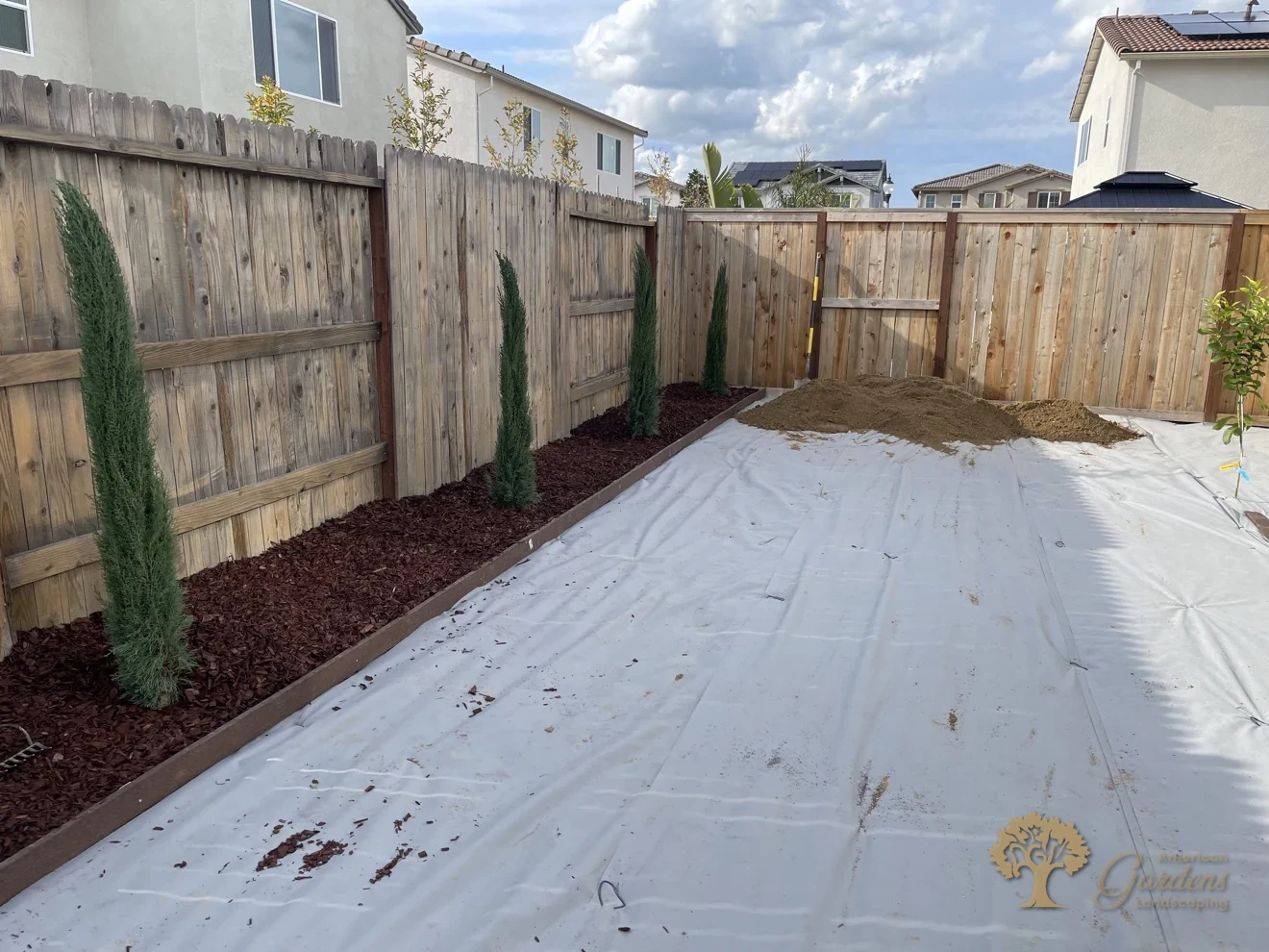 Yard fully covered with weed barrier in Lincoln – American Gardens Landscaping